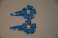 Ganchos azuis em flor com Hello Kitty 